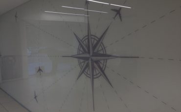 הדפסה על זכוכית בנמל תעופה, חיפוי זכוכית